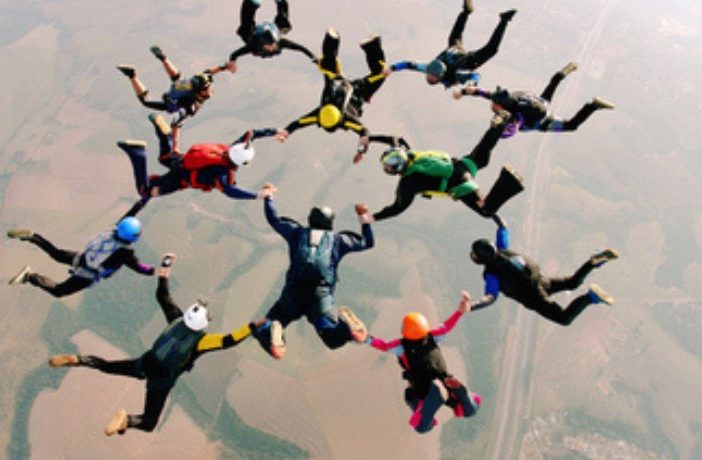 group of people skydiving