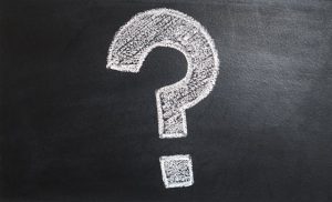 trusts, image of question mark on chalk board