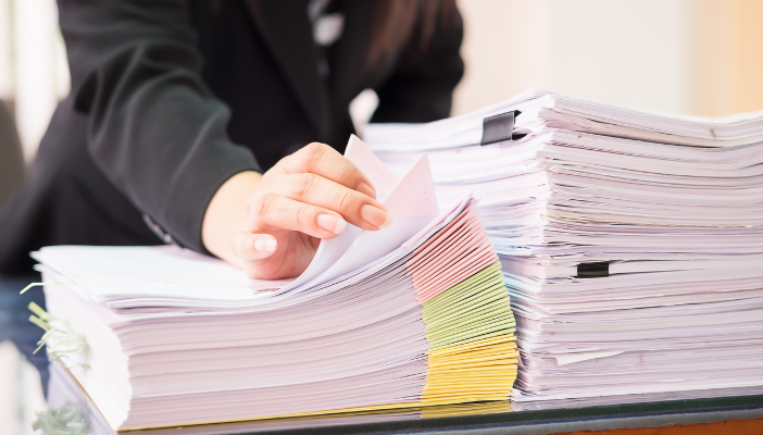 large stacks of paper