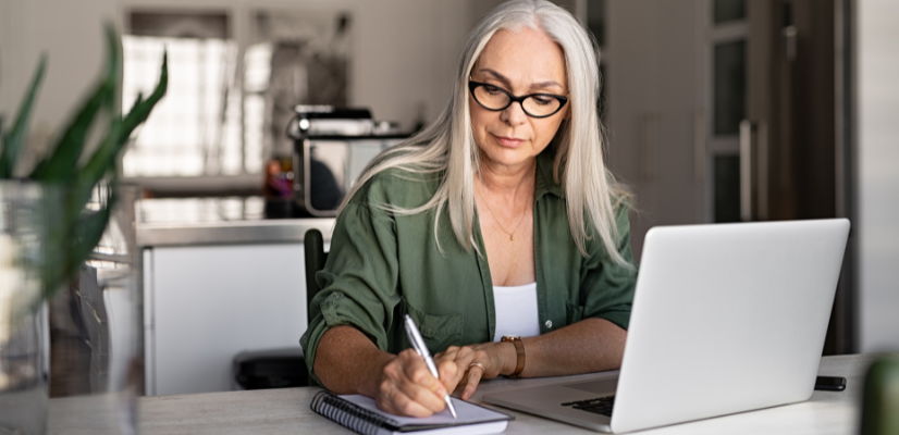 Woman working at a laptop computer