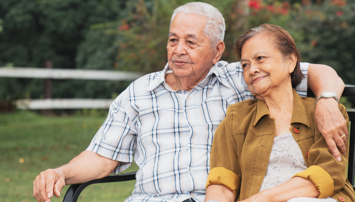 senior couple on a park bench