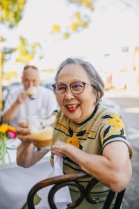 incapacity planning, image of senior woman drinking a warm beverage outside