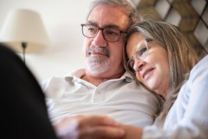 Can You Write Your Own Will in California, image of middle-aged woman resting head on man's shoulder