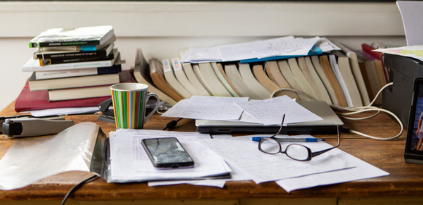 Organizing Your Estate Documents-papers in a pile on a desk